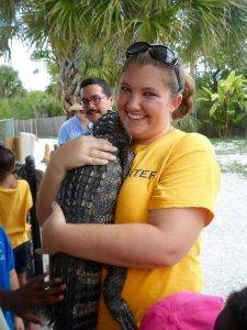 Student holding Alligator