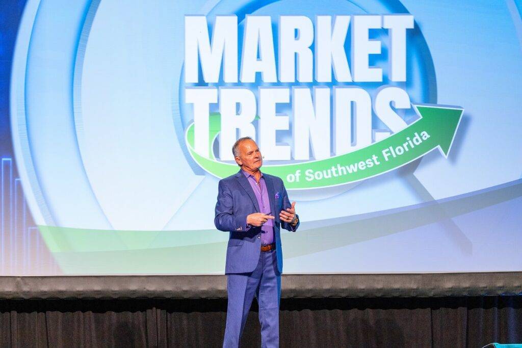Market Trends speaker Denny Grimes on stage