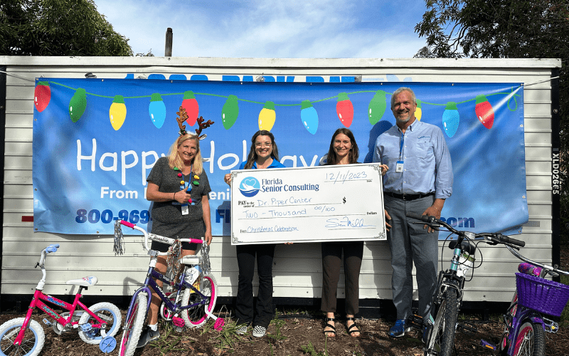 Florida Senior Consulting contributes $2,000 to Dr. Piper Center’s 108th annual Christmas Celebration